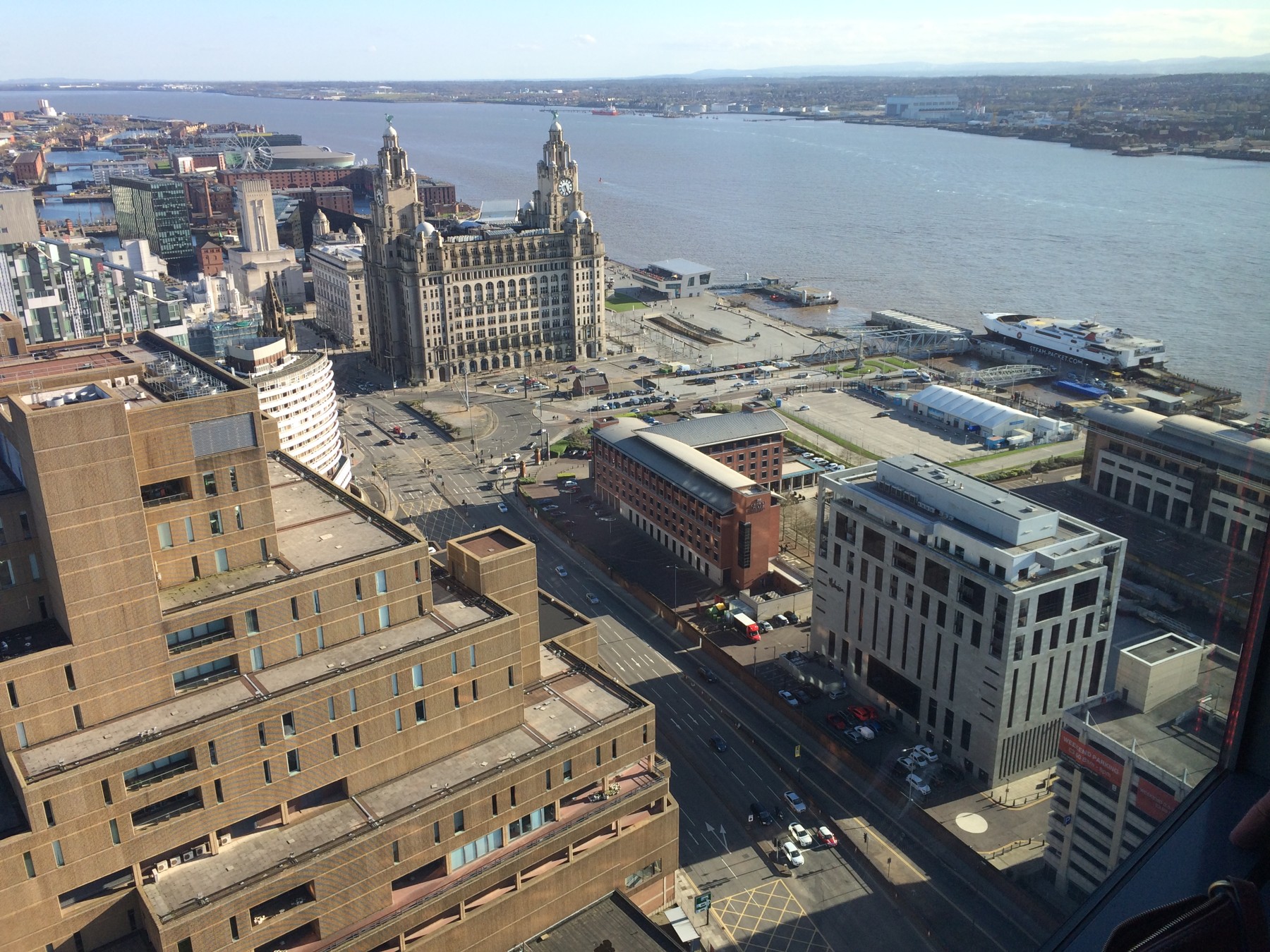 A view across Liverpool’s waterfront and the River Mersey, with the Royal Liver Building